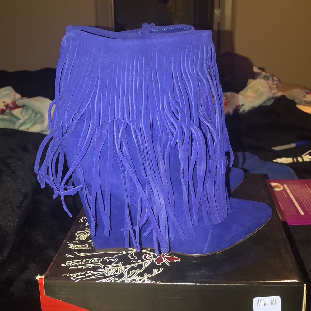 Blue suede fringe wedge boots